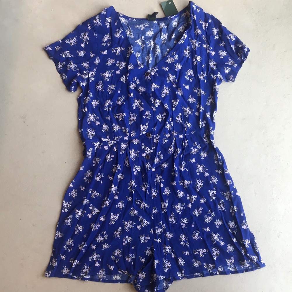 Royal blue short sleeved jumper with floral patter